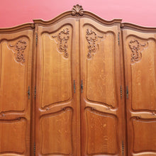 Load image into Gallery viewer, Antique French Oak 4 Door Breakfront Wardrobe Armoire with Hanging Rail and Shelves. B12804
