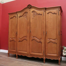Load image into Gallery viewer, Antique French Four-Door Armoire with Hanging and Shelving – Three Keys Included. B12264
