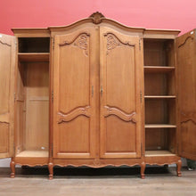 Load image into Gallery viewer, Antique French Four-Door Armoire with Hanging and Shelving – Three Keys Included. B12264

