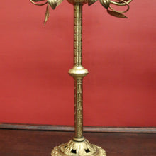 Load image into Gallery viewer, Antique French Brass Candlestick Holders with Lily Motif and Fretwork Base. B12309

