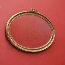 Load image into Gallery viewer, Vintage French Gilt Bevelled Edge Oval Wall Mirror with Ribbon Bow to the top. B12062
