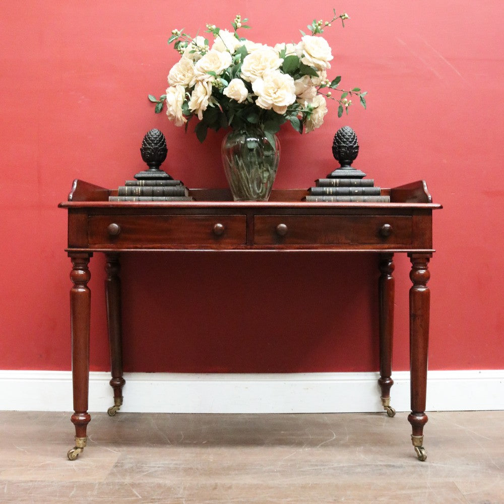 x SOLD Antique English Mahogany Two-Drawer Table – Gallery Back & Brass Castors. B12552