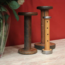 Load image into Gallery viewer, Three Antique Industrial Bobbins, Spools, Cotton or silk roving bobbins, now used as hat holder, Christmas scrolls, decorative pieces. B11502
