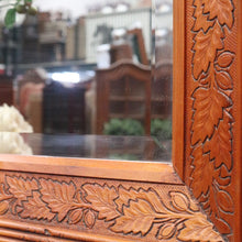 Load image into Gallery viewer, Antique Oak Wall Mirror Bevelled Glass Carved Leaves and Acorns. B12965
