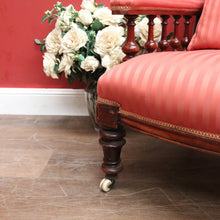 Load image into Gallery viewer, Antique Australian Cedar Grandfather Chair with striped coral-coloured fabric. B12560
