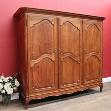 Load image into Gallery viewer, Antique French oak armoire or wardrobe with three doors and three keys. B12726
