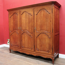 Load image into Gallery viewer, Antique French oak armoire or wardrobe with three doors and three keys. B12726
