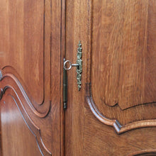 Load image into Gallery viewer, Antique French oak armoire or wardrobe with three doors and three keys. B12726
