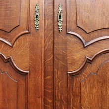 Load image into Gallery viewer, Antique French oak armoire or wardrobe with three doors and three keys. B12726

