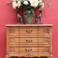 Load image into Gallery viewer, Vintage French chest of three drawers with carved detail and cast metal handles. B12824

