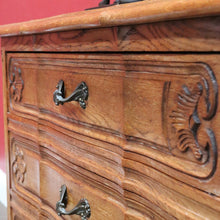 Load image into Gallery viewer, Vintage French chest of three drawers with carved detail and cast metal handles. B12824

