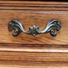 Load image into Gallery viewer, Vintage French chest of three drawers with carved detail and cast metal handles. B12824
