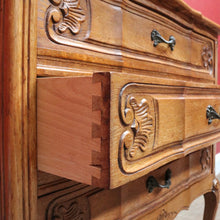Load image into Gallery viewer, Vintage French chest of three drawers with carved detail and cast metal handles. B12824
