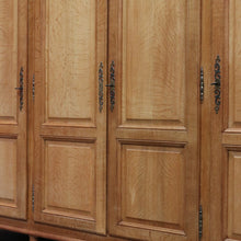 Load image into Gallery viewer, Antique French Oak 4 Door Armoire/ Wardrobe with hanging space shelves and three keys. B12743
