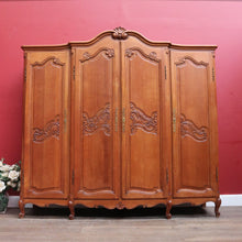 Load image into Gallery viewer, Antique French oak wardrobe / armoire with breakfront centre and fitted interior. B12722

