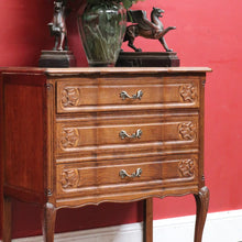 Load image into Gallery viewer, Vintage French chest of drawers with shaped front and brass handles. B12823
