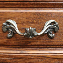 Load image into Gallery viewer, Vintage French chest of drawers with shaped front and brass handles. B12823
