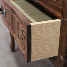 Load image into Gallery viewer, Vintage French chest of drawers with shaped front and brass handles. B12823

