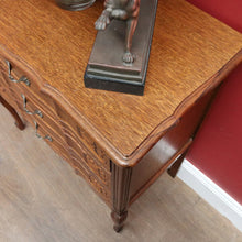 Load image into Gallery viewer, Vintage French chest of drawers with shaped front and brass handles. B12823
