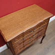 Load image into Gallery viewer, Vintage French chest of drawers with shaped front and brass handles. B12823
