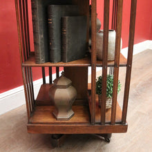Load image into Gallery viewer, Antique English Oak Revolving Solicitors Bookcase – Eight Section with Castors. B12617
