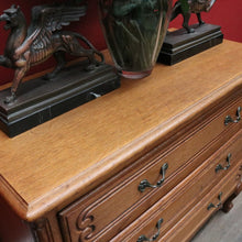 Load image into Gallery viewer, Vintage French oak chest of drawers with carved detail and cabriole legs. B12769
