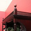 Load image into Gallery viewer, Antique Mahogany Display Cabinet with Fretwork, Drawers, and Glazed Doors. B12121
