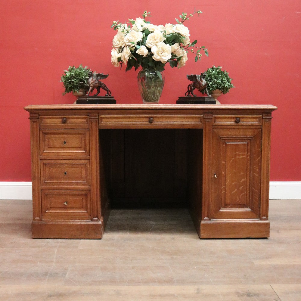 Antique English oak and tan leather office desk with drawers and cupboard. B12635