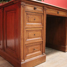 Load image into Gallery viewer, Antique English oak and tan leather office desk with drawers and cupboard. B12635
