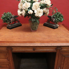 Load image into Gallery viewer, Antique English oak and tan leather office desk with drawers and cupboard. B12635
