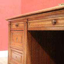 Load image into Gallery viewer, Antique English oak and tan leather office desk with drawers and cupboard. B12635

