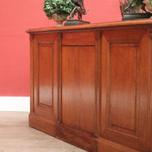 Load image into Gallery viewer, Antique English oak and tan leather office desk with drawers and cupboard. B12635

