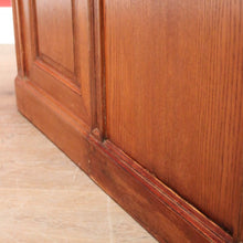 Load image into Gallery viewer, Antique English oak and tan leather office desk with drawers and cupboard. B12635
