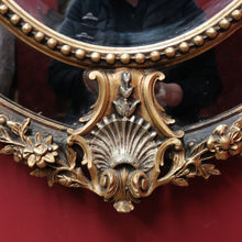 Load image into Gallery viewer, Vintage French Giltwood Oval Cushion Mirror with Silver Toned Cherubs and Rococo Gold Leaf Detail. B13047
