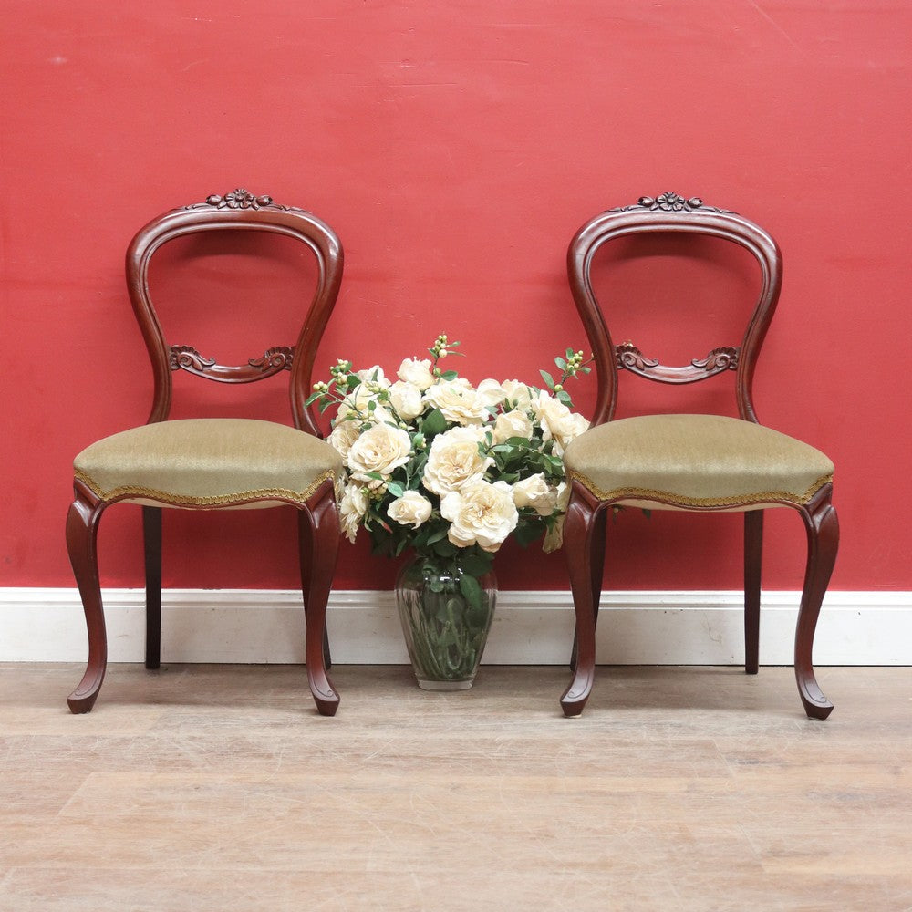 Pair of Australian Cedar Hall Chairs with Carved Floral Detail and Green Seats. B12649